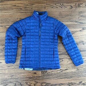 The North Face Women’s Navy Blue Puffer Jacket with floral lining